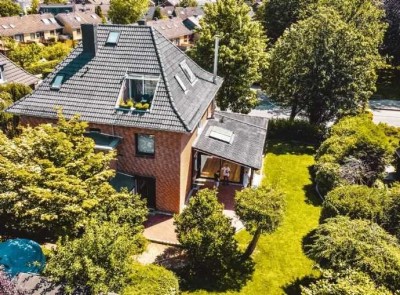 Urban & naturnah: Großzügige Terassenwohnung mit Traumküche, großem Garten und Sauna