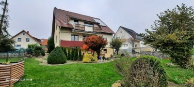 EG-Wohnung mit zusätzlichem Gartengeschoss und großem Garten