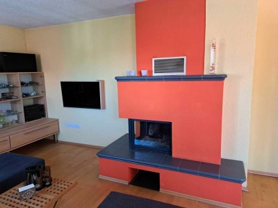 Ihr Traumhaus: Charmantes Einfamilienhaus mit großzügigem Garten und einladendem Kamin.