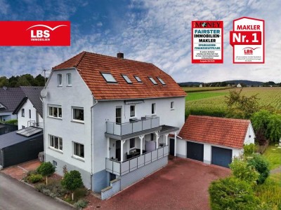 Attraktives Zweifamilienhaus mit Potenzial und Baugrundstück