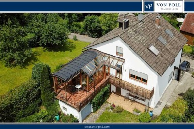 Großzügiges Mehrfamilienhaus mit drei Wohneinheiten und vielseitigem Gestaltungskonzept