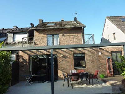 Einseitig angebautes Einfamilienhaus mit Keller und Garage in Viersen-Dülken