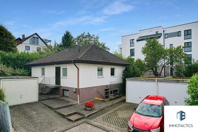 Ruhiger Bungalow mit großem Garten, vielseitigem Untergeschoss und drei Garagen in Bad Kreuznach