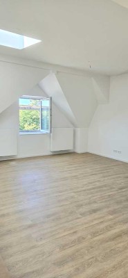 Neubau-Dachgeschosswohnung im Altbau – ökologisch & stilvoll