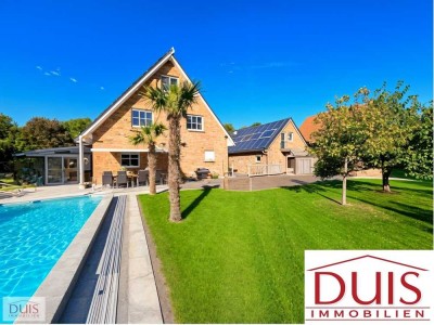 Exklusives Wohnerlebnis - Modernes EFH mit Wintergarten, Pool und nachhaltiger Energieversorgung!