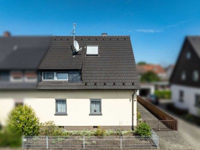Doppelhaushälfte mit zwei Bädern, Garage und großem Garten