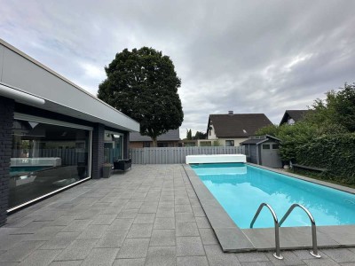 Leben auf einer Ebene - Bungalow mit Garage, Pool und Wohlfühlgarten