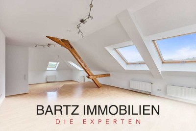 Stilvolle Dachgeschosswohnung mit Aufzug und zwei Stellplätzen in ehemaliger Kaserne