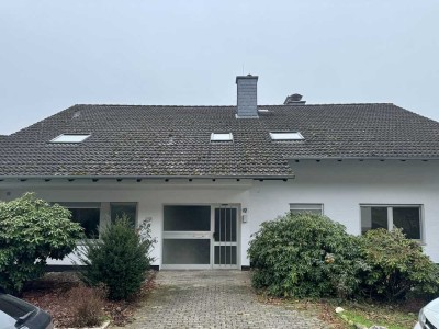 Wohnen auf einer Ebene mit Südbalkon, Gartenanbindung und Garage in ruhiger Lage