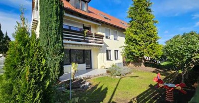 Ruhige 3 Zimmer Garten-Wohnung mit Wohnküche und Süd-Terrasse, Energieklasse B, provisionsfrei