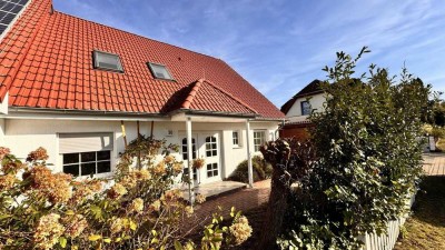 Haus mit Grundstück und Carport