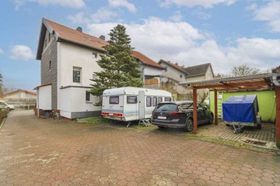 Gepflegte Doppelhaushälfte mit Garten und Stellplätzen sowie Möglichkeit für 2 Wohneinheiten