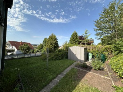 Helle 3-Zimmer Eigentumswohnung mit großem Garten und Garage