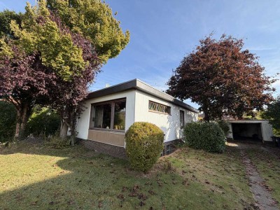 Gemütlicher Bungalow mit Potential!! Garage, hübschen Garten und unweit vom Nord-Ostsee-Kanal!