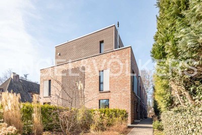 Familienglück am Wasser:
Modernes Townhouse in idyllischer Lage!