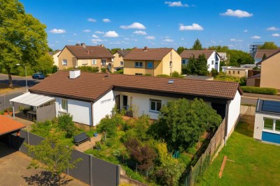 Großzügiger Bungalow mit Wintergarten, sonnigem Garten & zwei Garagen – ruhig und zentral in Ogg