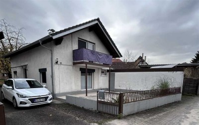 Einziehen und Wohlfühlen: Freistehendes Familienidyll mit großem Garten in Rheinbischofsheim