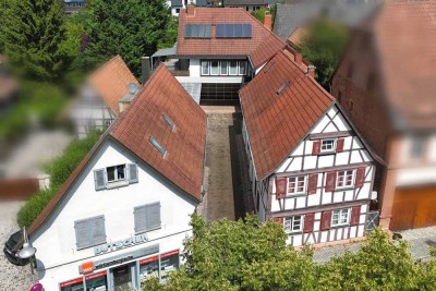 Wohnen und Gewerbe: 4 Wohnungen, 1 Laden, 1 Halle, Garten