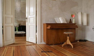 3-Zimmer-Wohnung mit Gartenanteil und Pkw-Stellplätzen