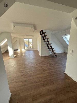 Attraktive 4-Zimmer-Dachgeschosswohnung mit gehobener Innenausstattung mit Einbauküche in Isselhorst