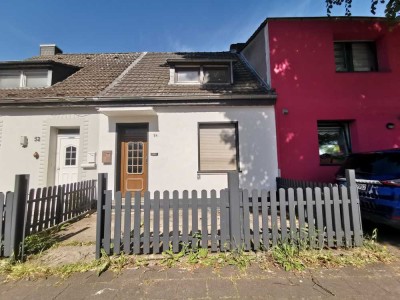 Frechen: Idyllisches Häuschen mit Potenzial, separate Garage und Garten!