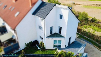 WIE NEU: Architektonisch ansprechendes und perfekt aufgeteiltes EFH in Feldrandlage - Energie A+