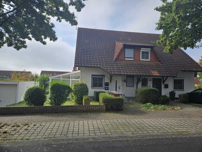 Gepflegte Doppelhaushälfte mit WG, PV-Anlage & Gartenidylle in ruhiger Wohnlage von Vellmar