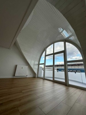 Einladende Dachgeschosswohnung mit Balkon