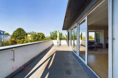 Einzigartige Dachgeschosswohnung mit atemberaubender Terrasse