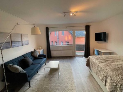 Sanierte möblierte 1 Zi.-Wohnung mit Balkon und Stellplatz.