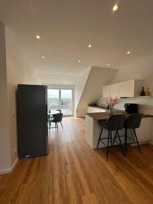 Wunderschöne Dachgeschosswohnung mit Blick auf Rheinebene!