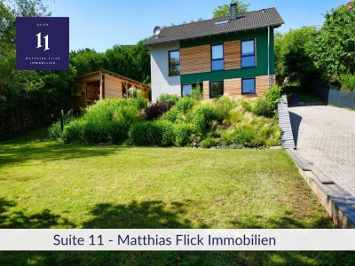 Neuwertiges Naturjuwel am Südhang – Ruhe, Stil & Nachhaltigkeit vereint!