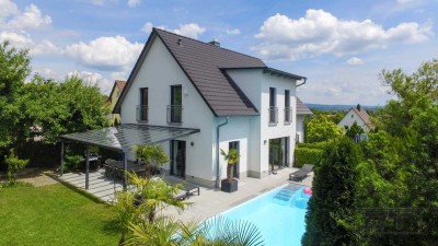 Luxuriöses Architektenhaus mit Einliegerwohnung, Pool und uneinsehbarem Grundstück am Roten Hügel!