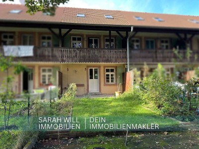 Maisonettewohnung im Reihenhausstil mit Garten in der geschichtsträchtigen Spiegelkolonie in MA