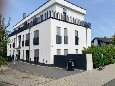 Neubau-Wohnung im Erdgeschoss: Stilvolle 3-Zimmer-Wohnung im Aukamm mit Tiefgaragenplatz