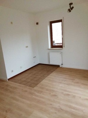 Schöne 1-Zimmer-Wohnung mit Terrasse, Gartenanteil & Garage – 31 m²