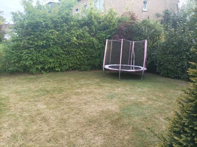 Terrassenwohnung mit großem Garten und Kamin