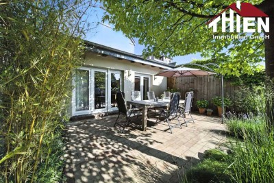 Vielseitiges Immobilienensemble mit zwei Häusern, Garten und Garagen