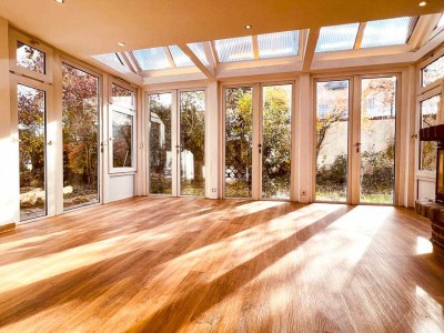 GROßZÜGIGE GARTENWOHNUNG MIT HELLEM SOUTERRAIN