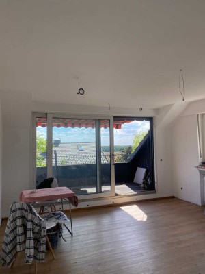 Schöne 3-Zimmer-Dachgeschosswohnung in begehrter Lage mit großem Balkon und schönen Ausblick