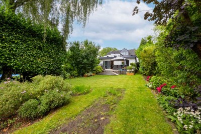 Bungalow mit Wärmepumpe sowie Wohn & Geschäftshaus - Wohnen & Arbeiten vereint mit großem Garten