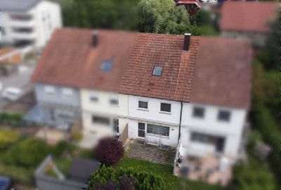 Sonniges Reihenhaus mit separatem Gartengrundstück