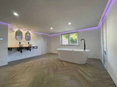 Modernes, energieeffizientes Einfamilienhaus auf drei Etagen mit insgesamt fünf Zimmern