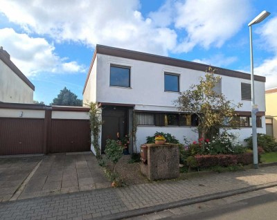 Gut gelegene Doppelhaushälfte mit schönem Garten & Garage – ideal für Familien