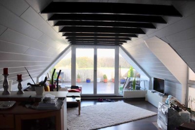 Außergewöhnliche Dachgeschosswohnung mit traumhafter 30 qm Dachterrasse und Blick ins Grüne