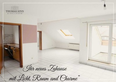 Helle 2,5- bis 3-Zimmer-DG-Wohnung mit Außenstellplatz in ruhiger Wohngegend