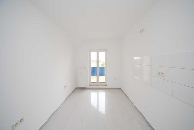 Schöne DG-Wohnung mit Balkon - in ruhiger und grüner Umgebung