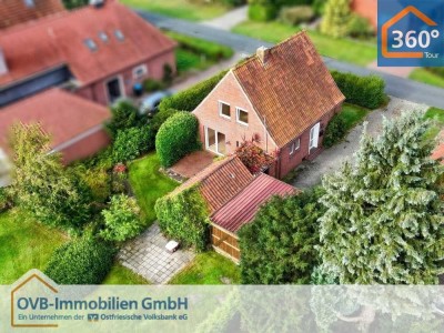 Siedlerhaus mit Carport und idyllischem Garten