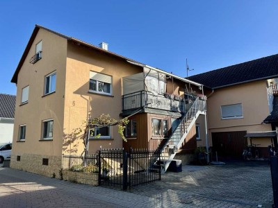 Teilvermietetes Mehrfamilienhaus mit 4 Wohnungen und 4 Garagen in Sinzheim-Kartung!