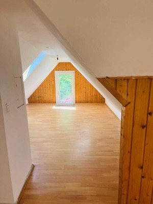 Traumhafte 7 Zimmer Maisonette Wohnung mit großzügigem Garten und Garage